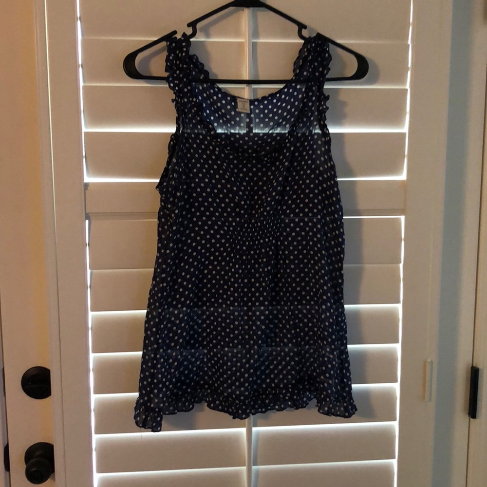 Sleeveless polka dot blouse